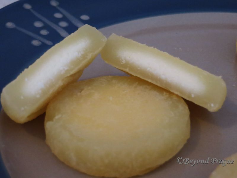 The typical look of Tvarůžky: a translucent yellowish outside around a solid white core.